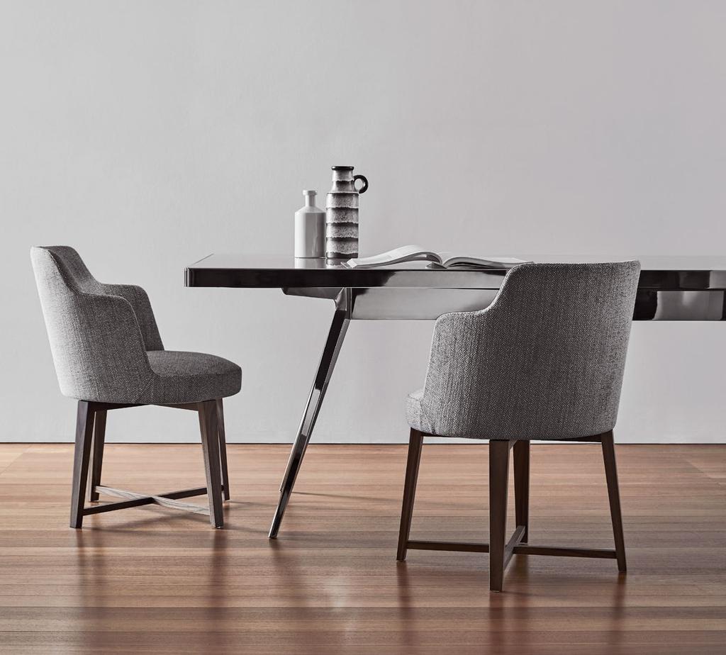 ITALY ERBA PRIVATE RESIDENCE HERA DINING ARMCHAIRS ZEFIRO TABLE 34 Hera è una famiglia di poltrone e sedie, che esprime una felice sintesi di ergonomia ed eleganza, espressamente progettata sia per