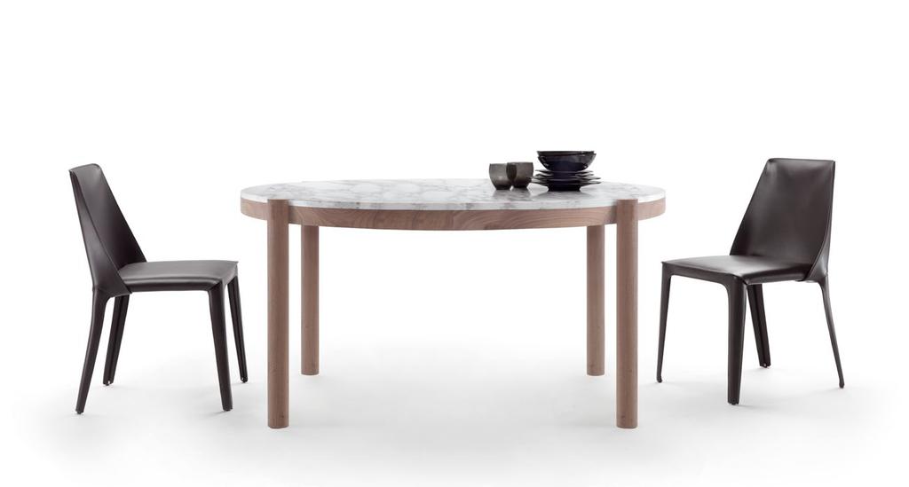 98 Il disegno del tavolo Gustav rivela il gusto per il dettaglio ricercato come quello rappresentato dall innesto della gamba tornita in legno massello con il piano del tavolo.