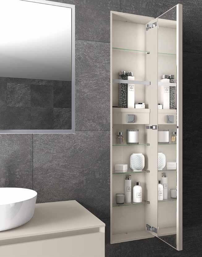 Gli elementi in acciaio verniciato, disponibili in 10 colori finitura opaca, e la maniglia sagomata arredano con stile distintivo la sala da bagno.