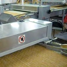 SLICES An innovative slice spreader system permits the automatic laying down