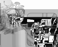 Oggetti e bagagli 79 Montaggio del portabici 1. Ruotare i pedali in posizione come mostrato nell'illustrazione e mettere la bicicletta nella cavità più avanzata della ruota.