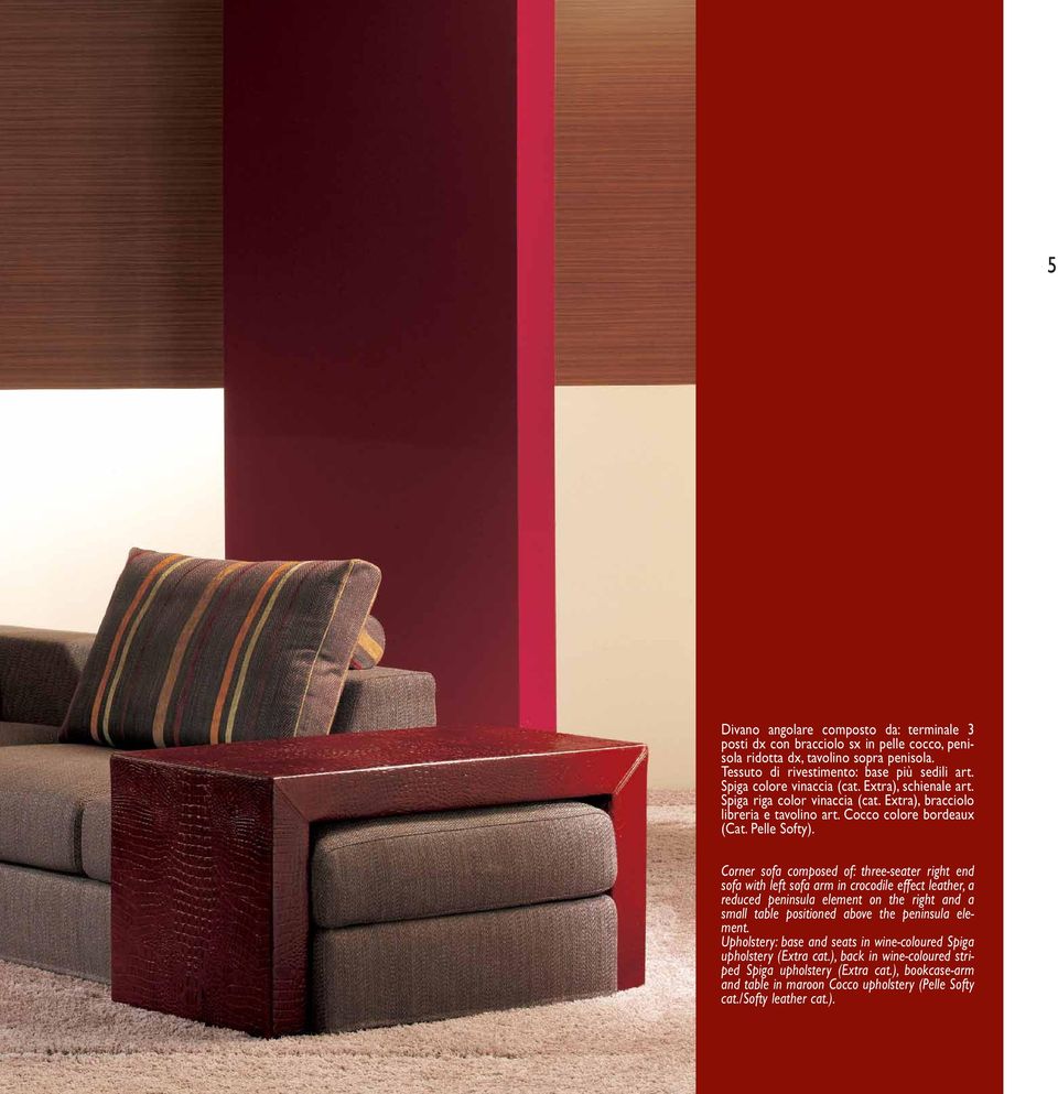 Corner sofa composed of: three-seater right end sofa with left sofa arm in crocodile effect leather, a reduced peninsula element on the right and a small table positioned above the peninsula