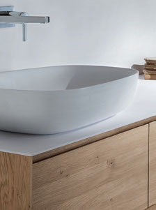 SHAPE EVO SHAPE EVO 186 Mobile SHAPE EVO con lavabo in appoggio laterale, top in Cristalplant, cassetti e maniglia a gola. In foto: lavabo in appoggio mod.