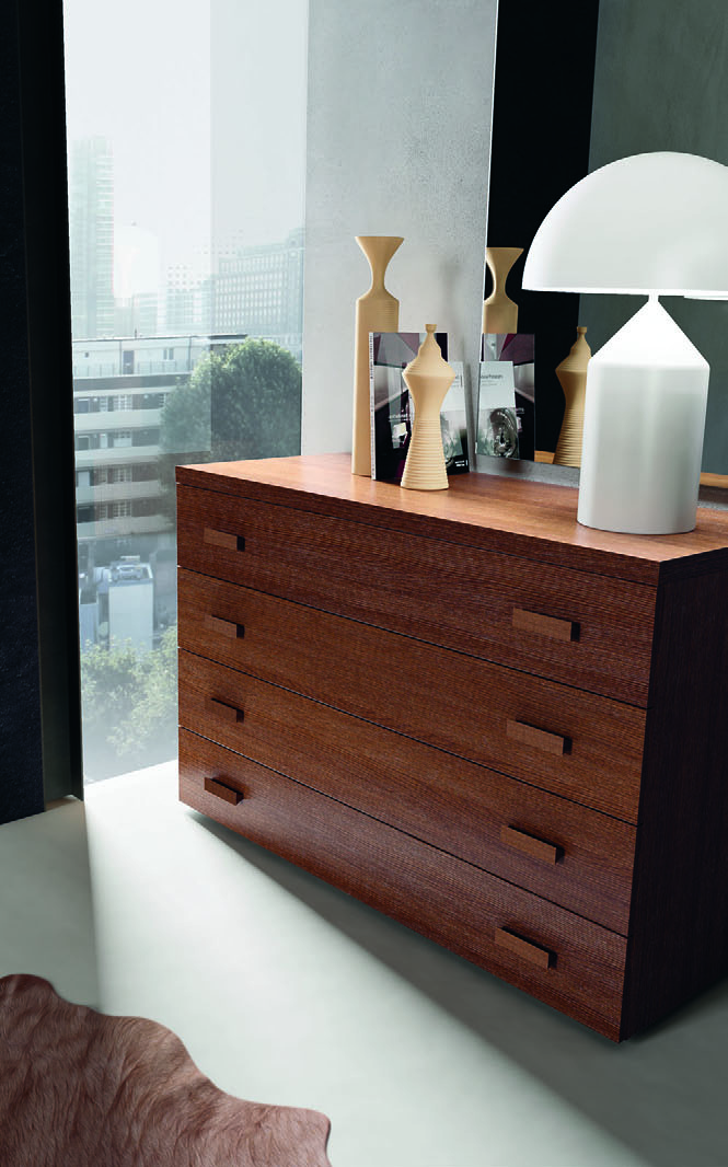 cubo 20. 21 The dresser as adornment, with its solid volumes and the lightness of an explicit project idea. The top, flush with the drawer fronts oozes the precision of contemporary style.