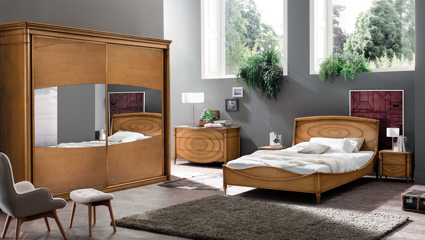 N116 LETTO SENZA PEDIERA CON PROFILI CURVILINEI / BED WITH CURVILINEAR PROFILES. FINITURA / FINISH: CACAO. N111 COMÒ A TRE CASSETTI / CHEST OF DRAWERS WITH THREE DRAWERS. FINITURA / FINISH: CACAO. N112 COMODINO A DUE CASSETTI / CABINET TABLE WITH TWO DRAWERS.