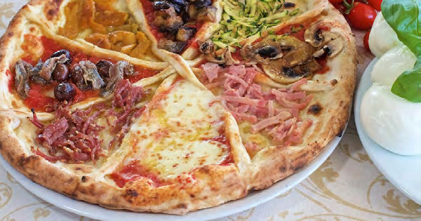 Tra il 1925 e il 1930 rinasceva nel Trianon di Napoli una pizza grandissima servita su un pesante piatto di acciaio.