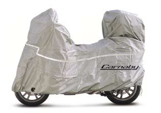 Customized Carnaby logo vehicle cover made of waterproof and breathable material. The cover includes two pockets to accommodate the accessories. Reflector strip and transparent cover plate.