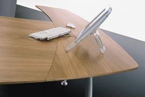 The shaped desks provided with return top includes an extra arch shaped arm for the