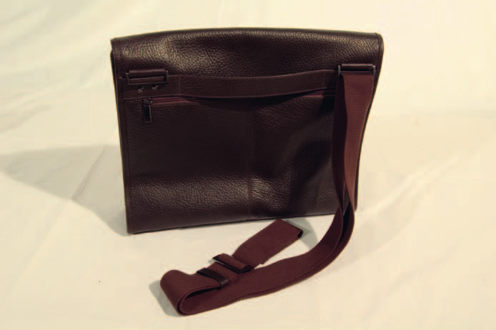 Front pocket with hidden zip, rear pocket with zip removable shoulder, rear loop for insertion on