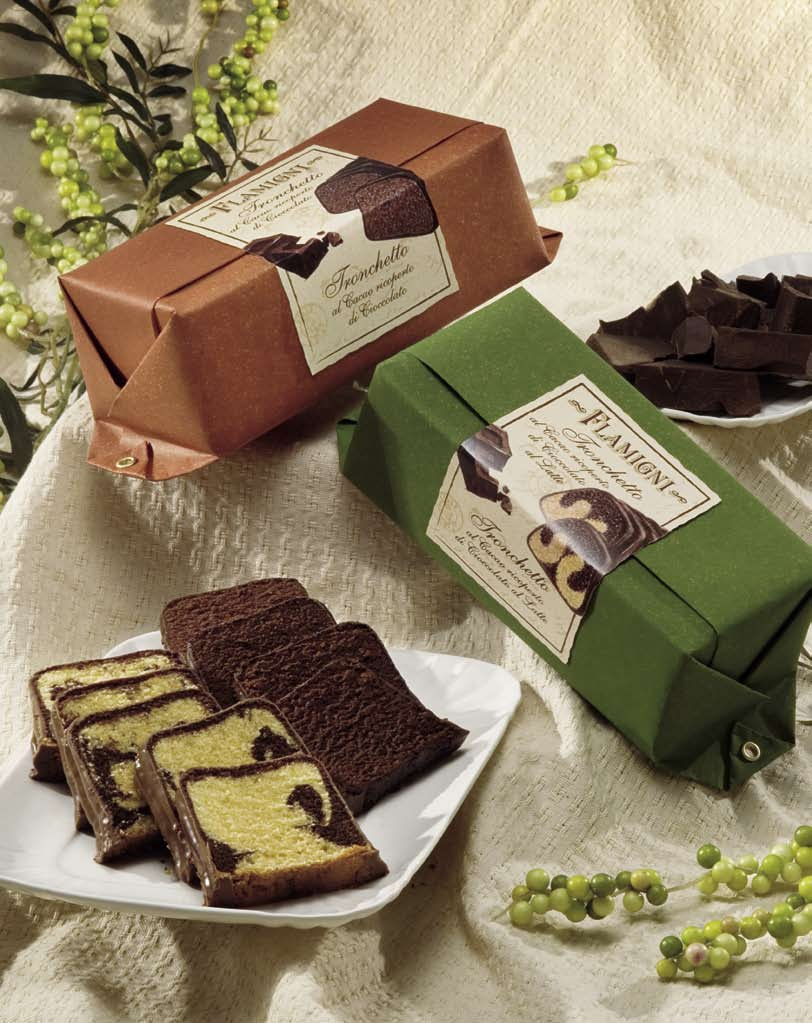 I Tronchetti al cioccolato Due nuove deliziose proposte: soffici e profumate torte ricoperte di cioccolato in un artigianale incarto rivettato Art.