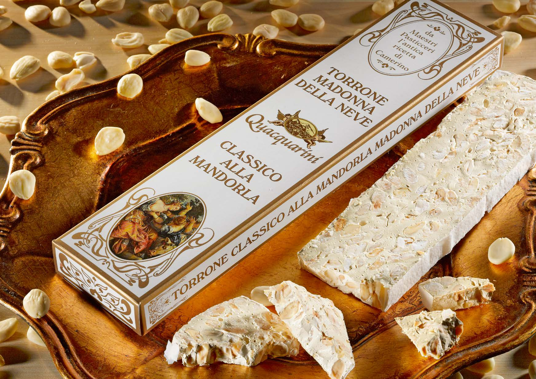 i Torroni MADONNA DELLA NEVE Prodotto con il 60% di mandorle, che nasce seguendo una lunga cottura a bagno maria in vasca di rame, secondo l antica ricetta del Torrone di Camerino.