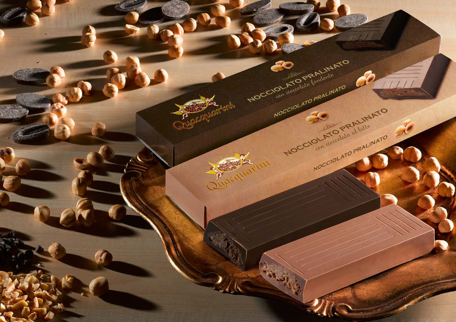 i Torroni NOCCIOLATO PRALINATO Gustose nocciole tostate e macinate si legano al cioccolato in una morbida pralina di nocciole che rende il cuore di questo prodotto unico nel suo genere.
