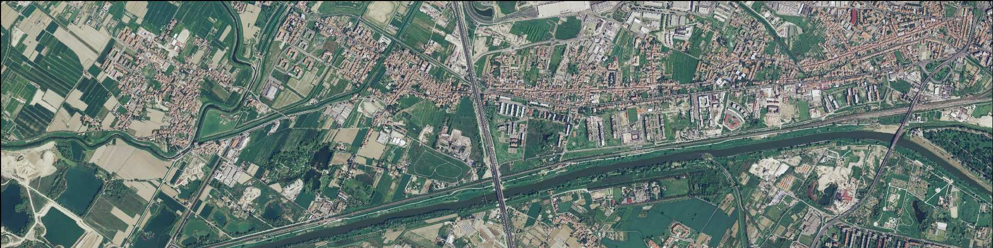 DESCRIZIONE: Si tratta di un aggregato produttivo che si sviluppa tra il torrente Vingone e via Pisana, costituito da una pluralità di insediamenti