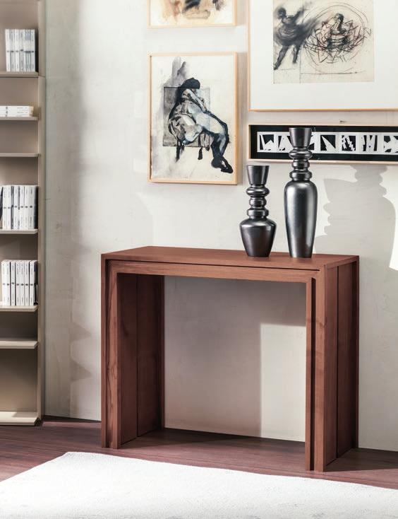 Extendible console-table with structure in solid ash and ash veneered tops. Equipped with 4 or 5 extensions to change the size of the table. Telescopic mechanism in aluminium.