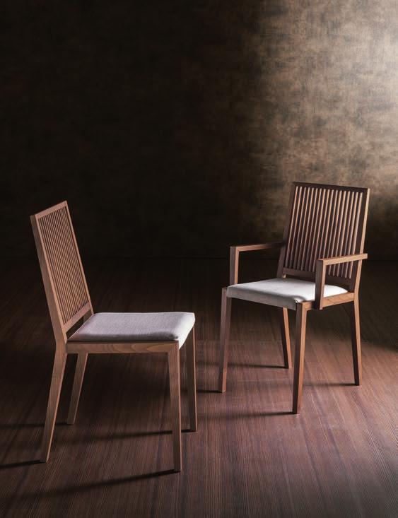 Chair with structure in solid ash, covered in leather, eco-leather or fabric of the collection.