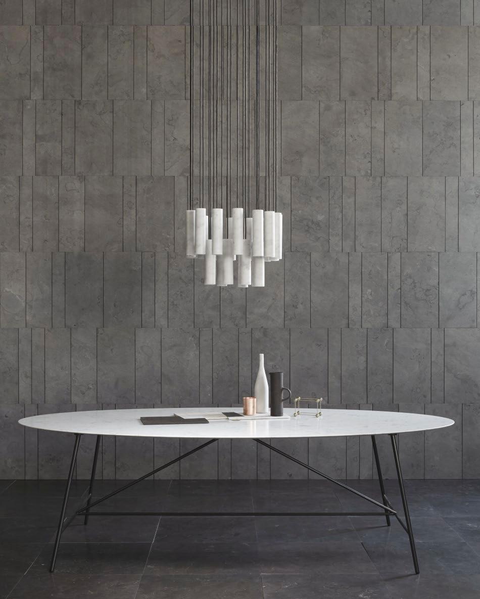 DINING Bianco Carrara Honed Levigato W by David Lopez Quincoces The W series plays with the concept of weightlessness, brought to life by an über-fine top in natural stone which contrasts with
