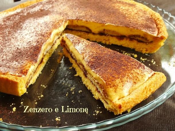 CROSTATA TIRAMISU' INGREDIENTI Per la pasta frolla: 300 g di farina 00 80 g di burro freddo a pezzetti 100 g di zucchero 1 uovo + 1 tuorlo 1 cucchiaio da tè di lievito in polvere per