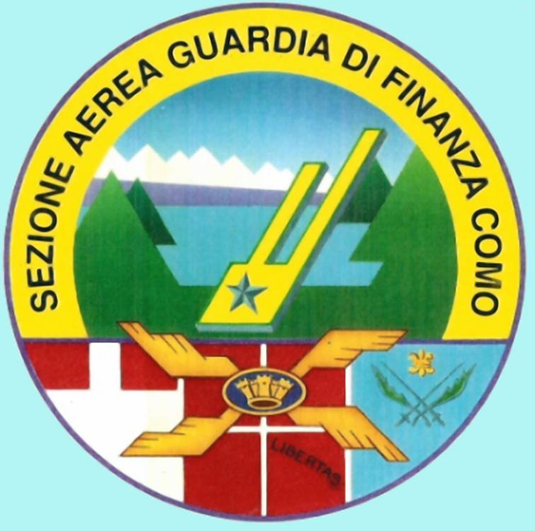 Distintivo disegnato nel 1990 dal Lgt. pil. Mario Toncelli a simbolo della Sezione Aerea G. di F. di Como in Venegono, rappresentato nel Crest della diapositiva prece_ dente.