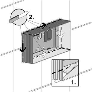 ❷ Tagliare gli angoli della scatolato di revisione fino a livello della parete e poi proseguire lungo i bordi laterali.