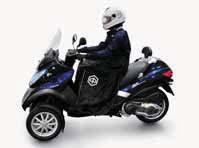 Black colour with reflector strip, transparent plate window and chain ring. Piaggio logo.