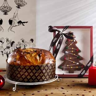 E poi, un grande biscotto al cioccolato a forma di albero di Natale, con decorazioni in glassa di zucchero, in una bella scatola regalo.