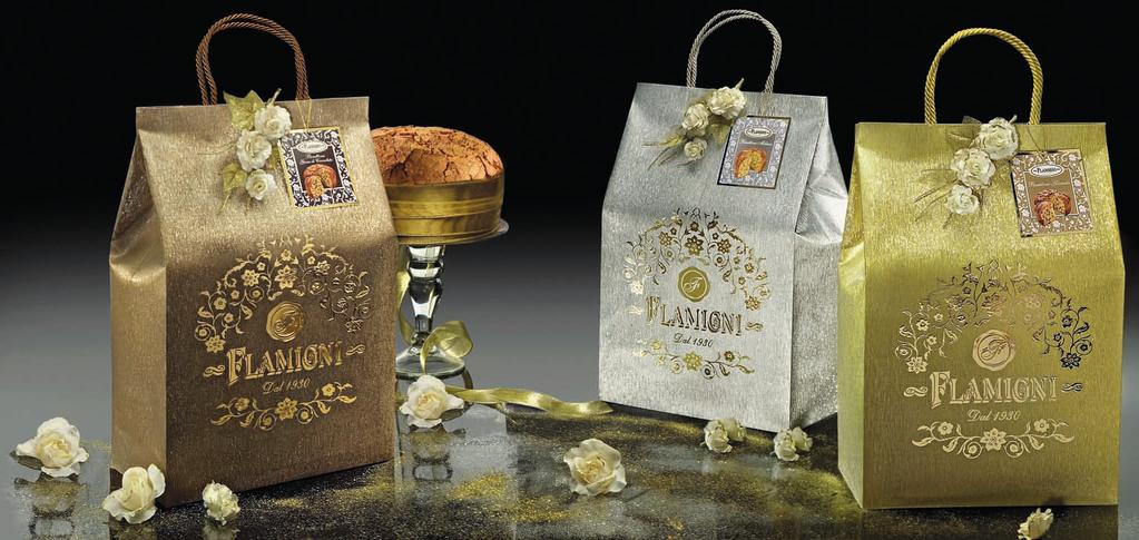 Linea Oro Il Panettone in sacchetto regalo Un packaging estremamente luminoso ed elegante per la nostra linea di lusso The Panettone in gift bag An extremely bright and elegant packaging for our