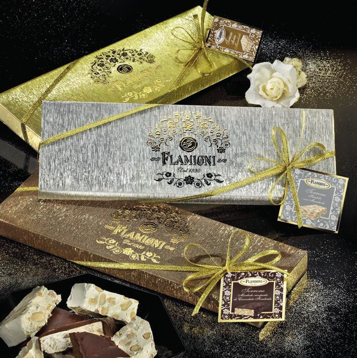 136 La gamma dei nostri torroni in raffinate e scintillanti confezioni realizzate a mano Torroncini morbidi assortiti Assorted small soft nougats 200g 10 pz per ct The gift cases Our