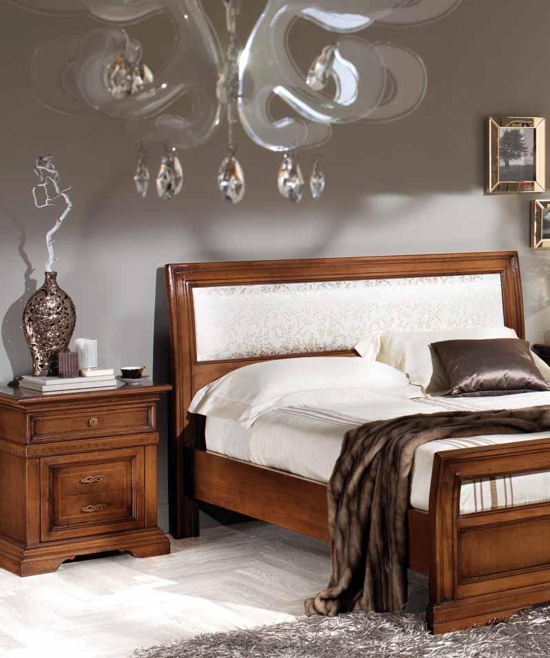 The beds of the Regina collection are distinguished by the headboard available with inserts of fine fabric,