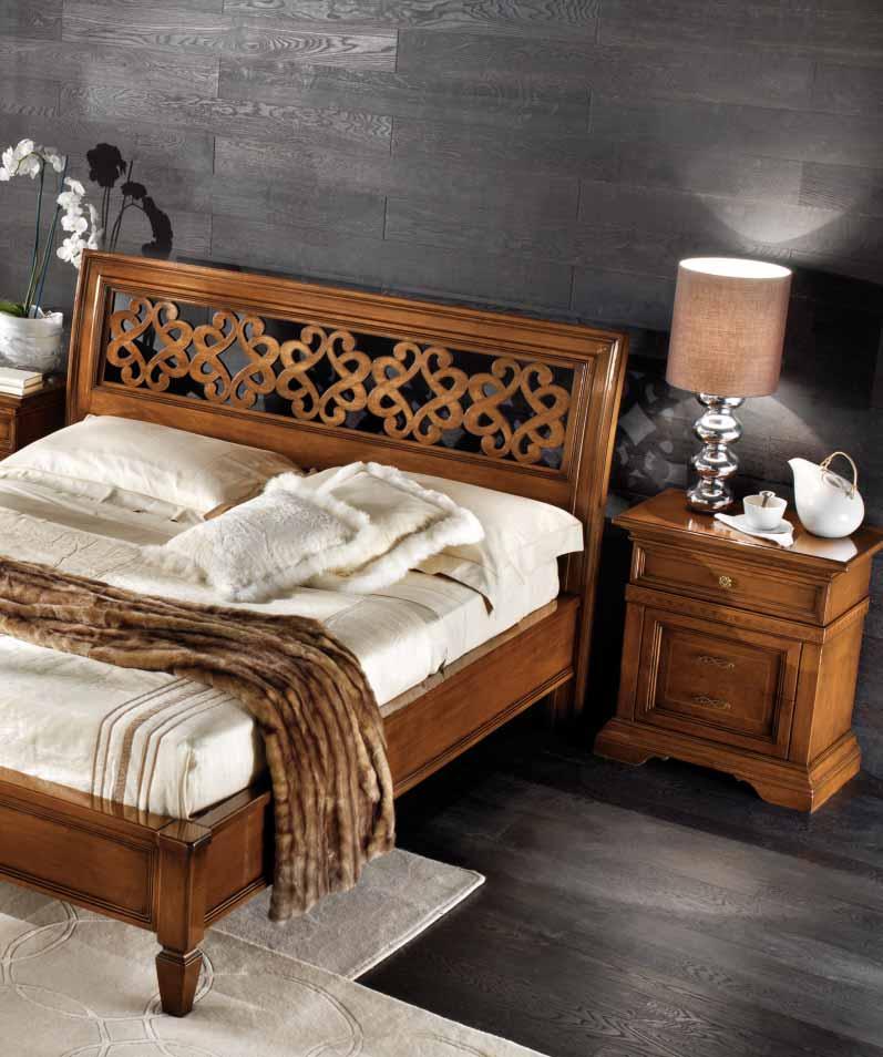 Bed Item LT144 pierced with floral motive and bed-frame.