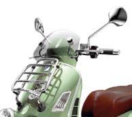 Top box kit painted in vehicle cover, genuine leather backrest pad matching with saddle material and colour. Chrome-plated Vespa logo. Comes with GTV specific fixing plate.