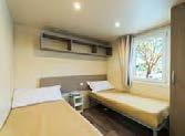 with small freezer, kitchenware, bathroom with shower and toilet, private parking and private garden with outdoor furnishings.