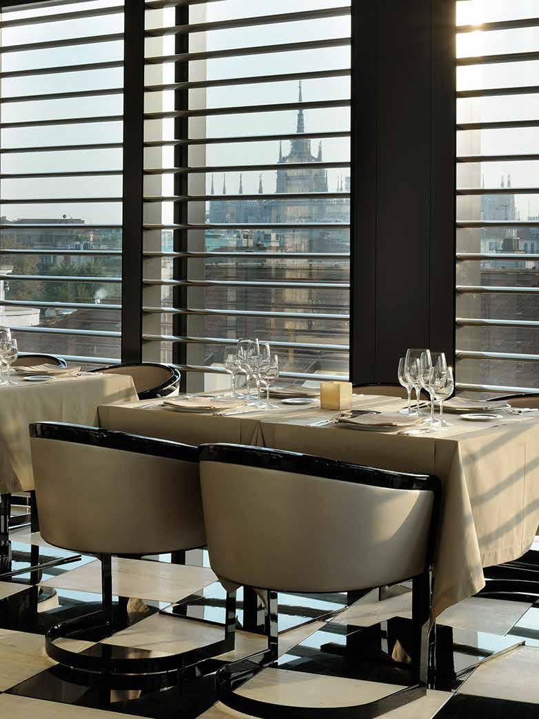 Dine The dining venues within the Armani Hotel Milano, with their floor-to-ceiling high glass windows, give a breathtaking panoramic view on the rooftops and the terraces of Milan creating an elegant