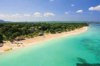 caraibi - - negril Beaches Resort & Spa Beachfront Junior suite Speciali riduzioni per bambini dai 2 agli 11 anni residente a Un perfetto equilibrio tra relax e
