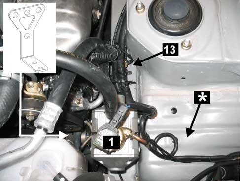 1) RIDUTTORE DI PRESSIONE 13) SENSORE TEMPERATURA F3 Il riduttore viene posizionato sul longherone lato guida dietro al radiatore.