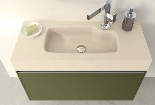 CHANGE / 129 La forma del lavabo integra il rubinetto nel design della consolle. Il monoblocco è una soluzione multifunzionale compatta e armonica nella semplicità geometrica.