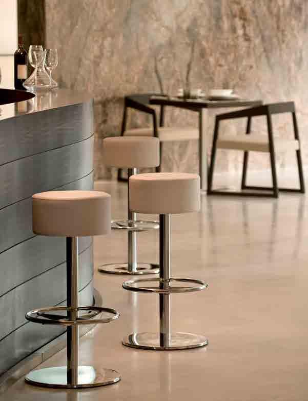 Lotus bar stool, chromed column and polished stainless steel base, available also in the brushed version.