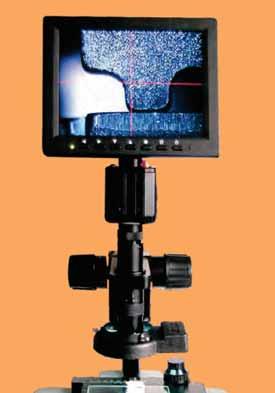 Videomicroscopio zoom "EVM" Codice 4001702 Il videomicroscopio zoom, completo di tavola di posizionamento, movimento micrometrico e messa a fuoco, include: sistema di visione con ottica zoom