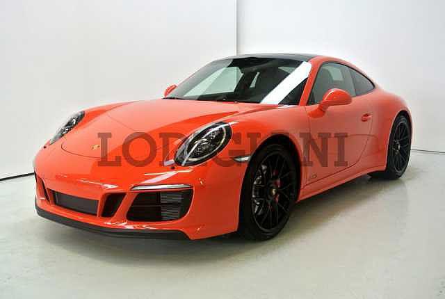 Porsche 911 Carrera 4 GTS 911 Immatricolazione: KM: 0 Colore: Arancione Lava metallizzato Carrozzeria: Veicolo sportivo Cilindrata: 2981 Alimentazione: Benzina Prezzo: 164.
