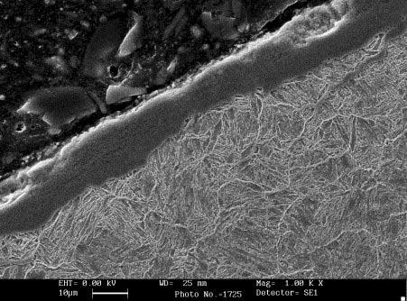 Fig. 3a SEM micrograph of sample 0. Fig. 3a Micrografia SEM del campione 0. Fig. 3b SEM micrograph of sample 5. Fig. 3b Micrografia SEM del campione 5.