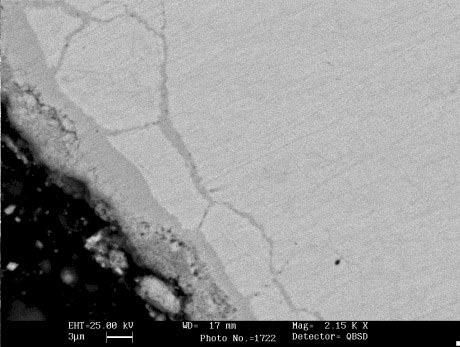 diffuse porosity and some cracks and the outer surface is friable with scaling, mainly in the deeply decarburized samples. In the diffusion zone, dark precipitates formed at the grain boundaries. Fig.