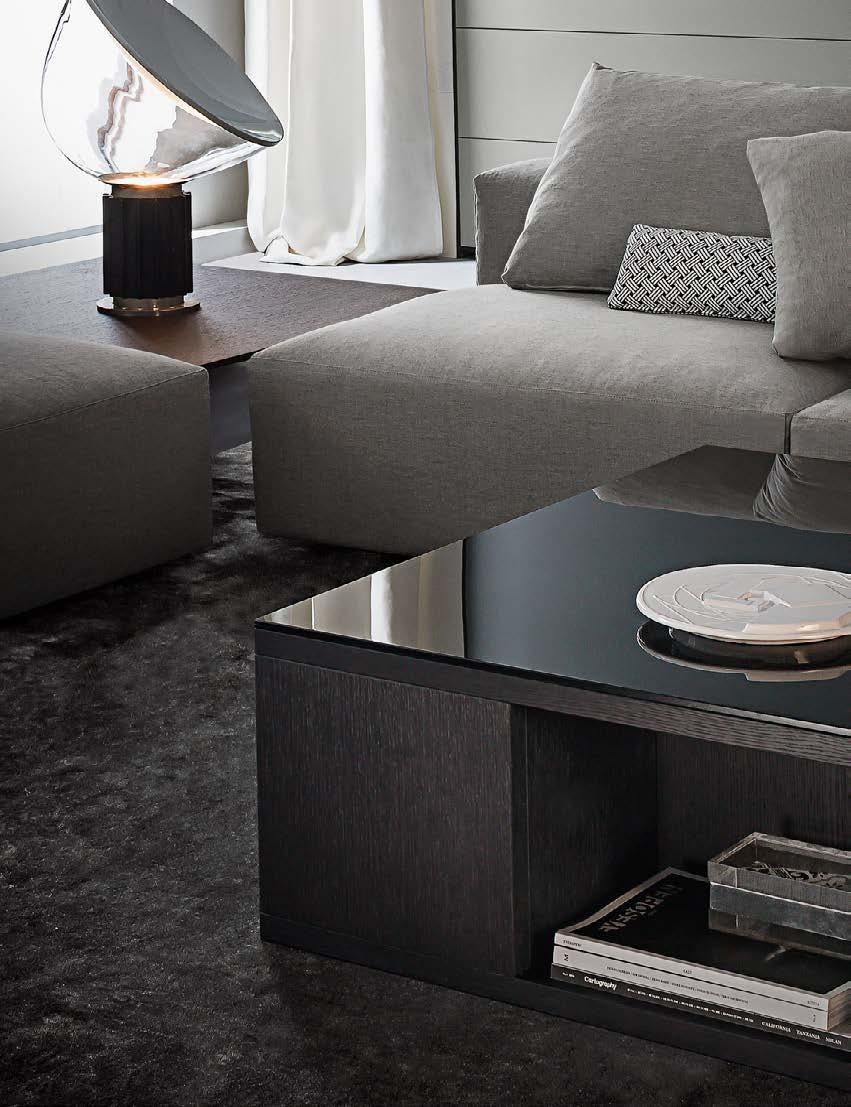 Pouf Soft Square in tessuto. On the previous page and this, Flexus composition in coal oak and matt lacquered grigio peltro. Frame composition in coal oak and matt lacquered ottanio.