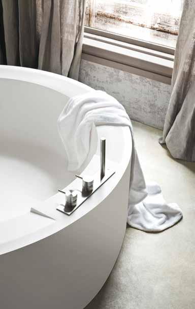 ole Rotonda Maxi a perfezione della forma circolare disegna la vasca ole. Realizzata in Corian, è personalizzabile esternamente con laccatura Soft Touch, argilla.