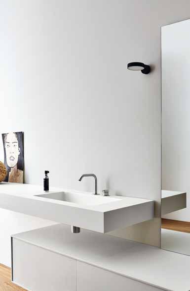 Top Corian avabo rettangolare Rectangular washbasin Top con lavabo integrato realizzato a mano e copripiletta rotonda a filo.