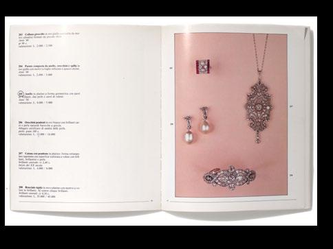 15 PLATINUM, RUBIES, DIAMONDS AND PEARLS RING, CIRCA 1930 2.000-2.