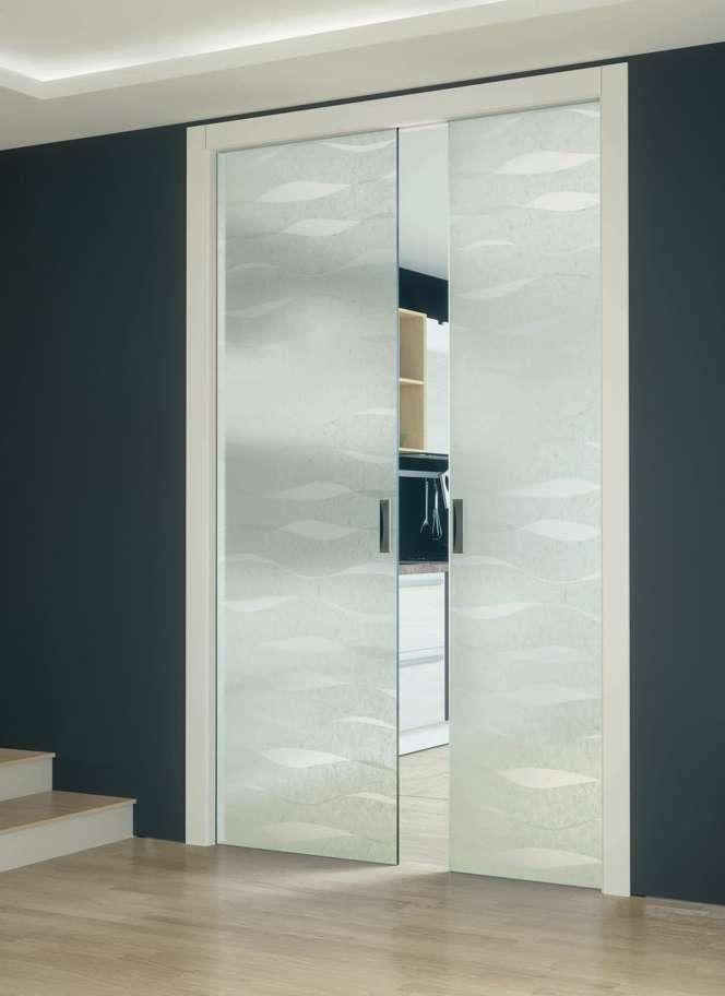 Sliding door inside wall Easy in two section, white lacquered wooden jamb.