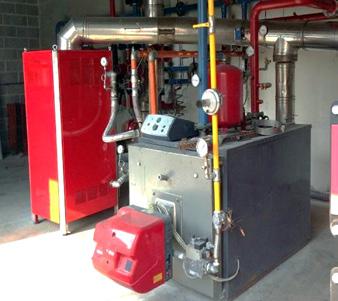 Recuperatore di calore dall aria calda, umida e sporca proveniente dagli scarichi dei mangani (dispositivi per la stiratura) di una lavanderia industriale.