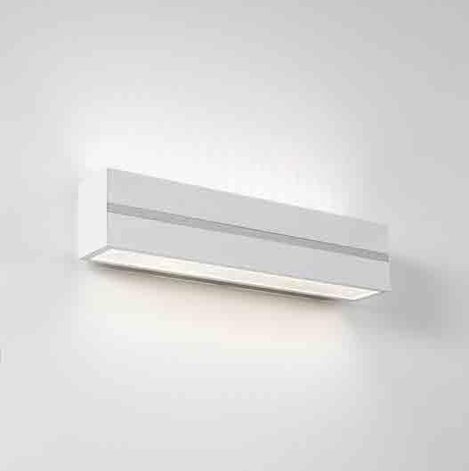 JO Lampada a LED da parete a diffusione. Corpo in alluminio personalizzabile in diverse finiture o verniciato in vari colori secondo palette RAL. Illuminazione superiore e inferiore a parete.