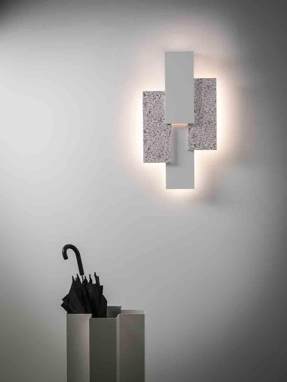 Diffusion wall lamp with LED. The aluminium body can be customized with stainless steel in different finishes or varnished as RAL palette.
