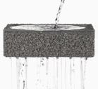 Lo strato di usura drenante è costituito da una miscela di pietrischetti frantumati, poca sabbia e filler; sono dei conglomerati aperti che forniscono rugosità superficiale elevata, stabilità,