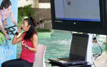 Wifi monitoring system that can be used in the water (even in open waters) and provides real-time data, such as the heart rate, on a pool-side pc or lcd monitor at any time of the training or